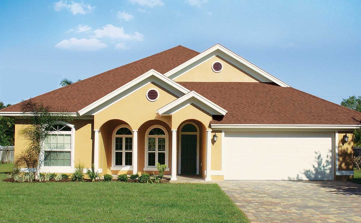 House plan exterior: one-story stucco home with tiled hip roof, arched windows, covered entryway, and two-car garage.