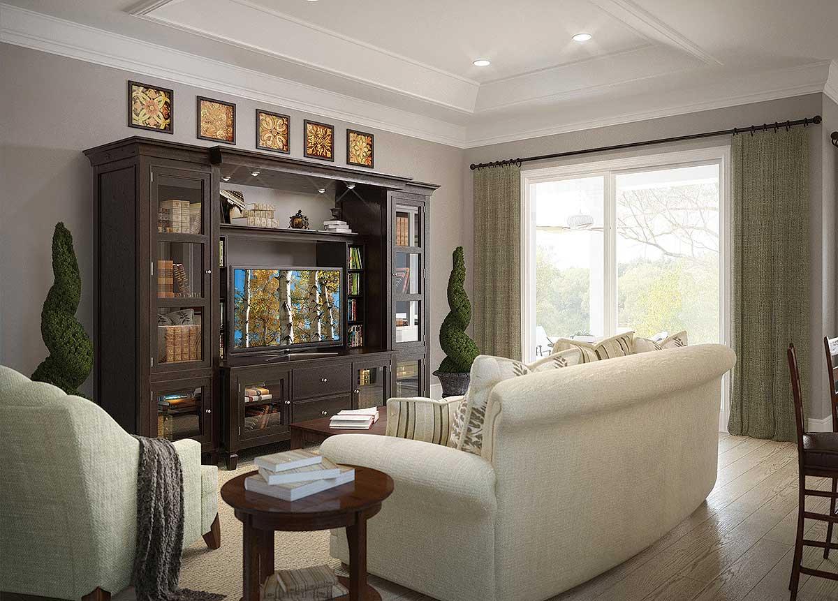 Living room interior with coffered ceiling, built-in entertainment center, sofas, armchair, and large window.