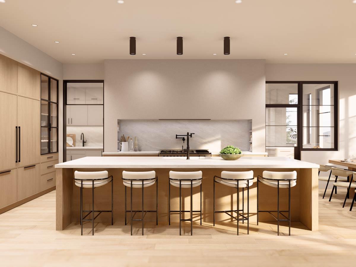 Modern kitchen with large island, light wood cabinetry, gas range, and pendant lighting. Open to dining area.