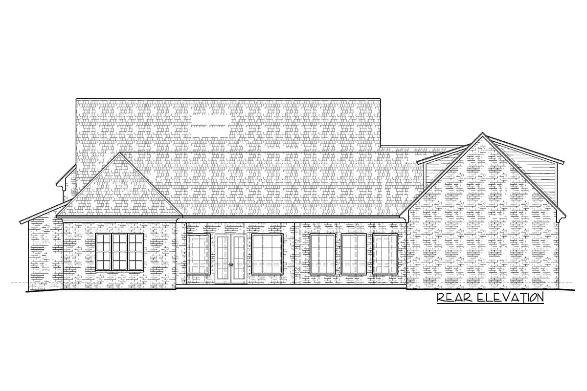 Rear elevation drawing of a house plan with brick exterior, multiple gables, and several windows.