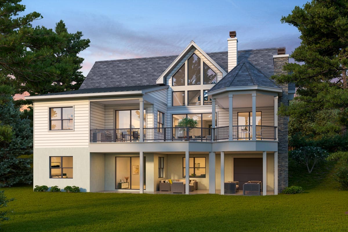 House plan exterior: Multi-story Modern Farmhouse with wraparound deck, gable roof, large A-frame window, and stone chimney.