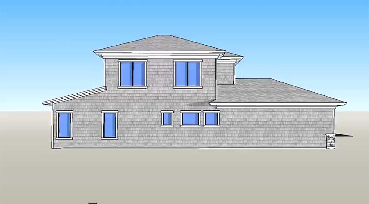 Two-story house plan exterior with shingle siding, multiple gables, and diverse window groupings.