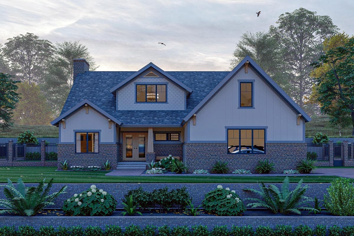 House plan exterior: Modern Farmhouse style, two stories, brick base, gabled dormers, and covered entryway.