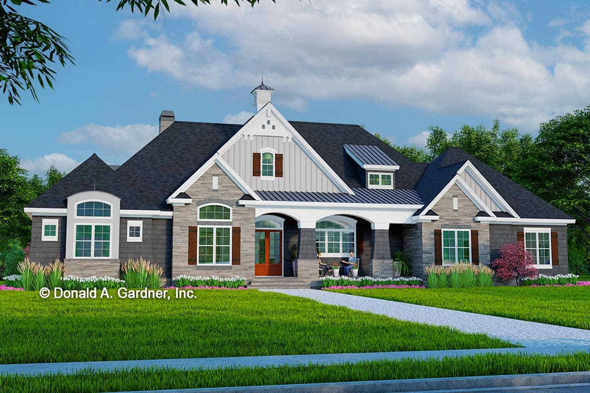 House plan exterior. One-story house with a gabled roof, stone and siding facade, and a covered porch with arched detailing.