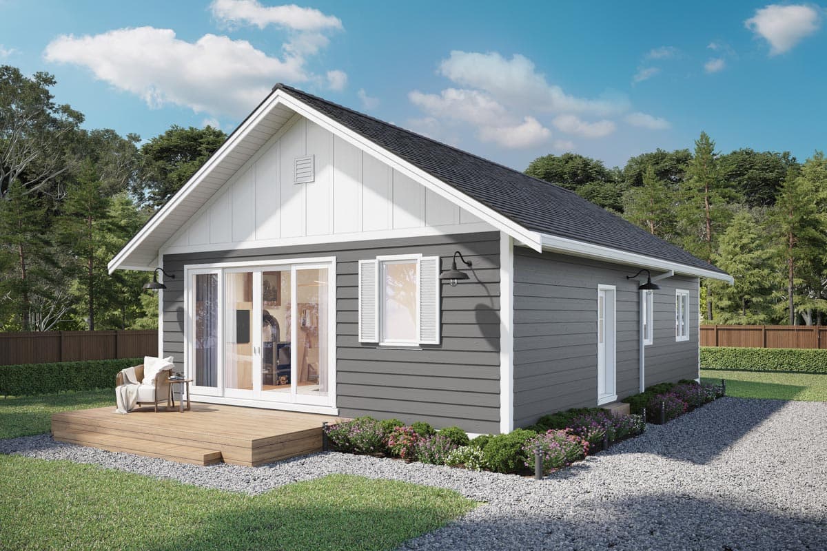 House plan exterior with a single story, gable roof, and sliding glass door. Includes a wooden deck and a contrasting white gable end.