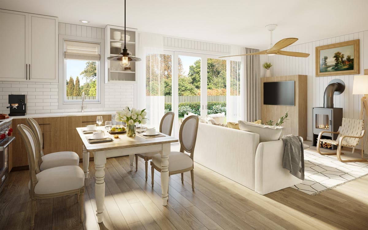 Interior rendering of an open-concept living area and kitchen with a dining table, sofa, fireplace, and large sliding doors.