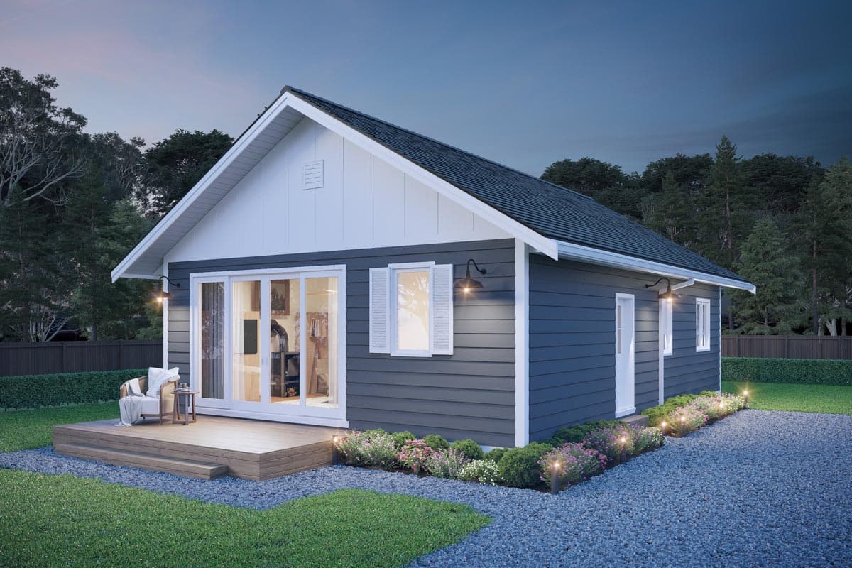 Modern Ranch house plan exterior with siding, gable vents, deck, and large sliding glass doors.