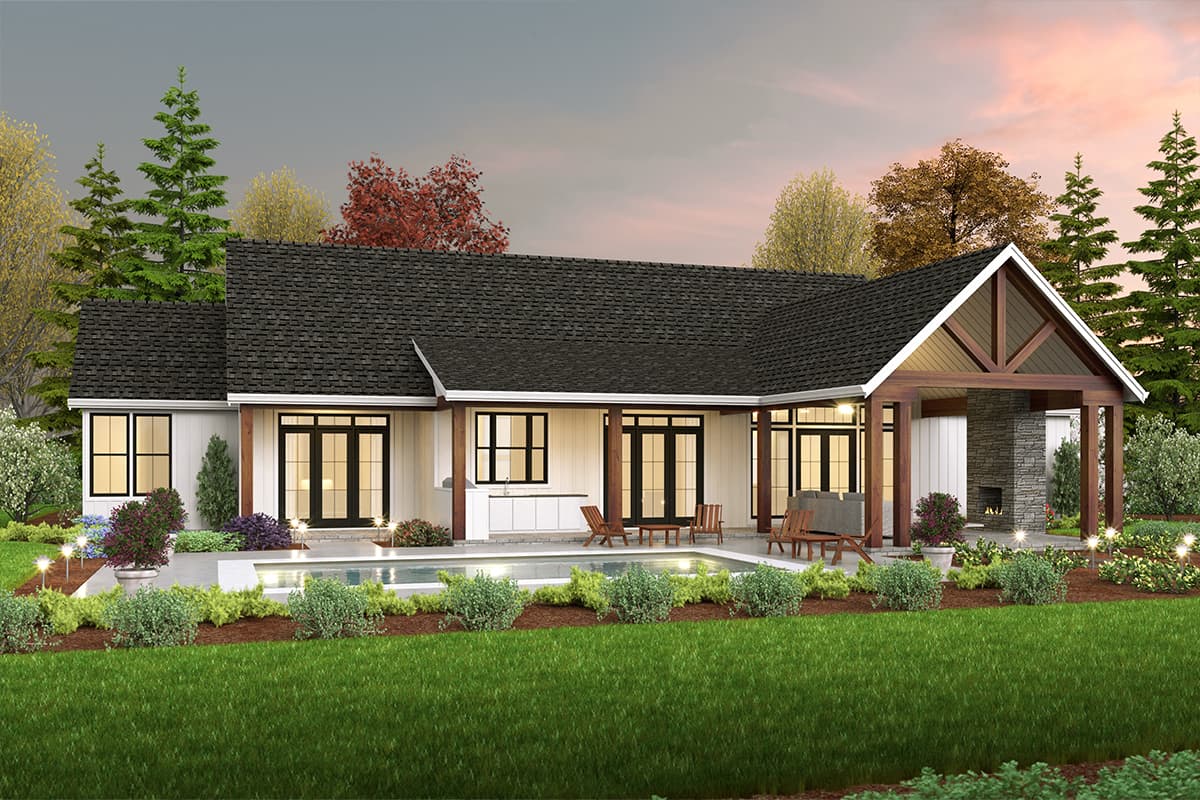 House plan exterior: single-story Modern Farmhouse with a covered patio, L-shaped roofline, and stone fireplace.