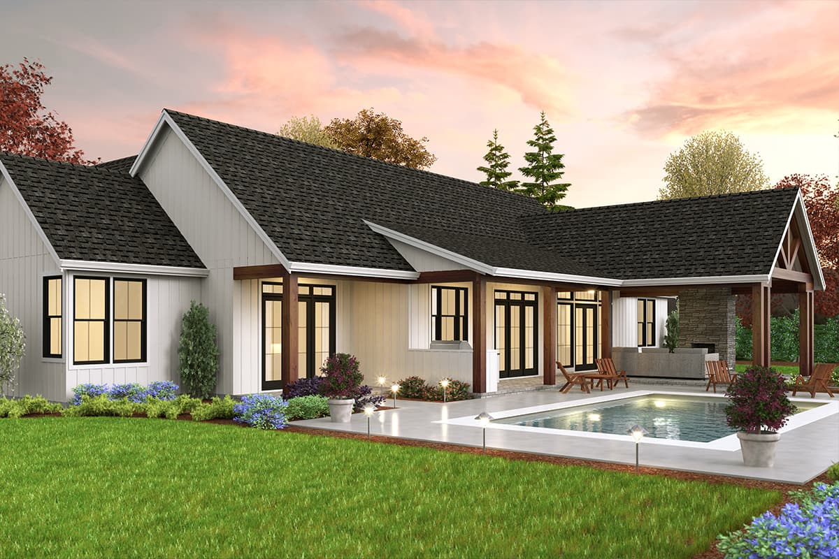 Modern Farmhouse house plan exterior with gables, covered patio, and swimming pool.