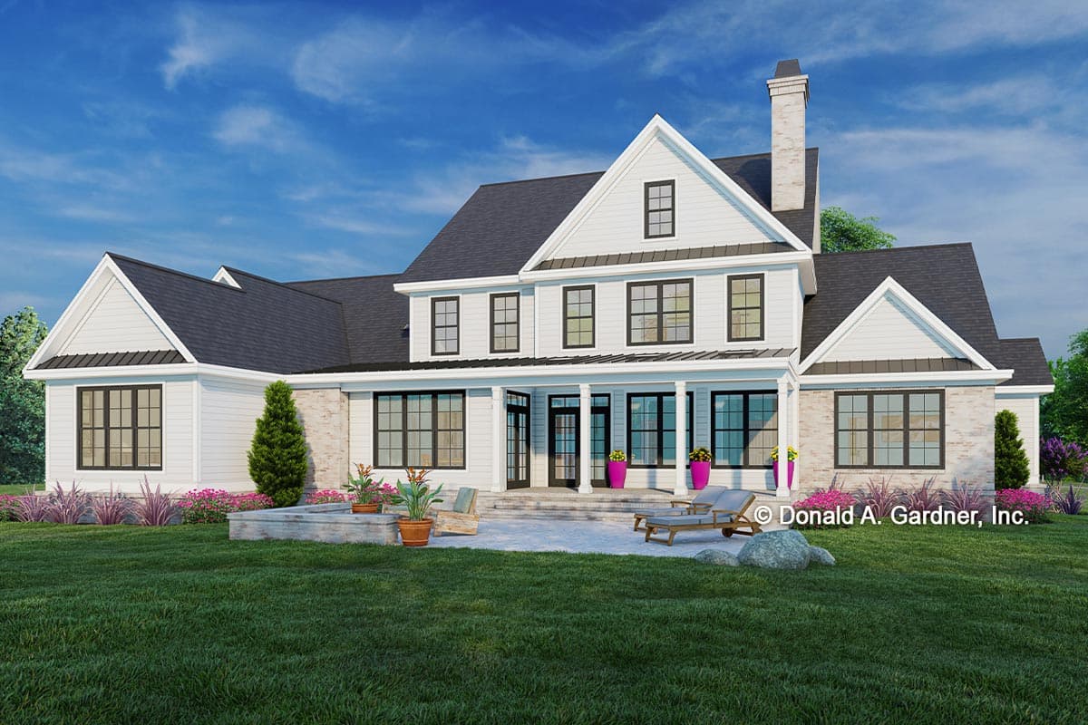 Modern Farmhouse house plan exterior with two stories, prominent gables, a wraparound porch, and stone accents.