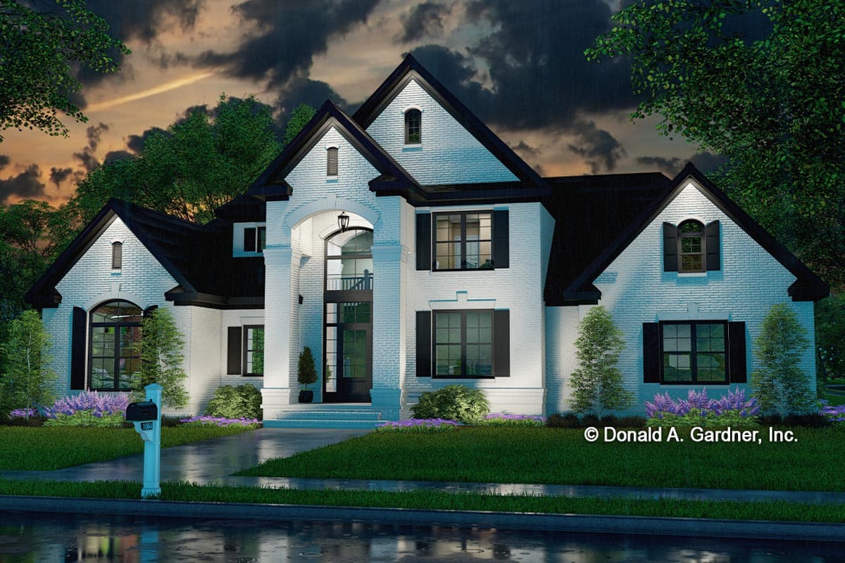 House plan exterior: Two-story Modern Farmhouse with white brick, prominent gables, arched entryway, and black-shuttered windows.