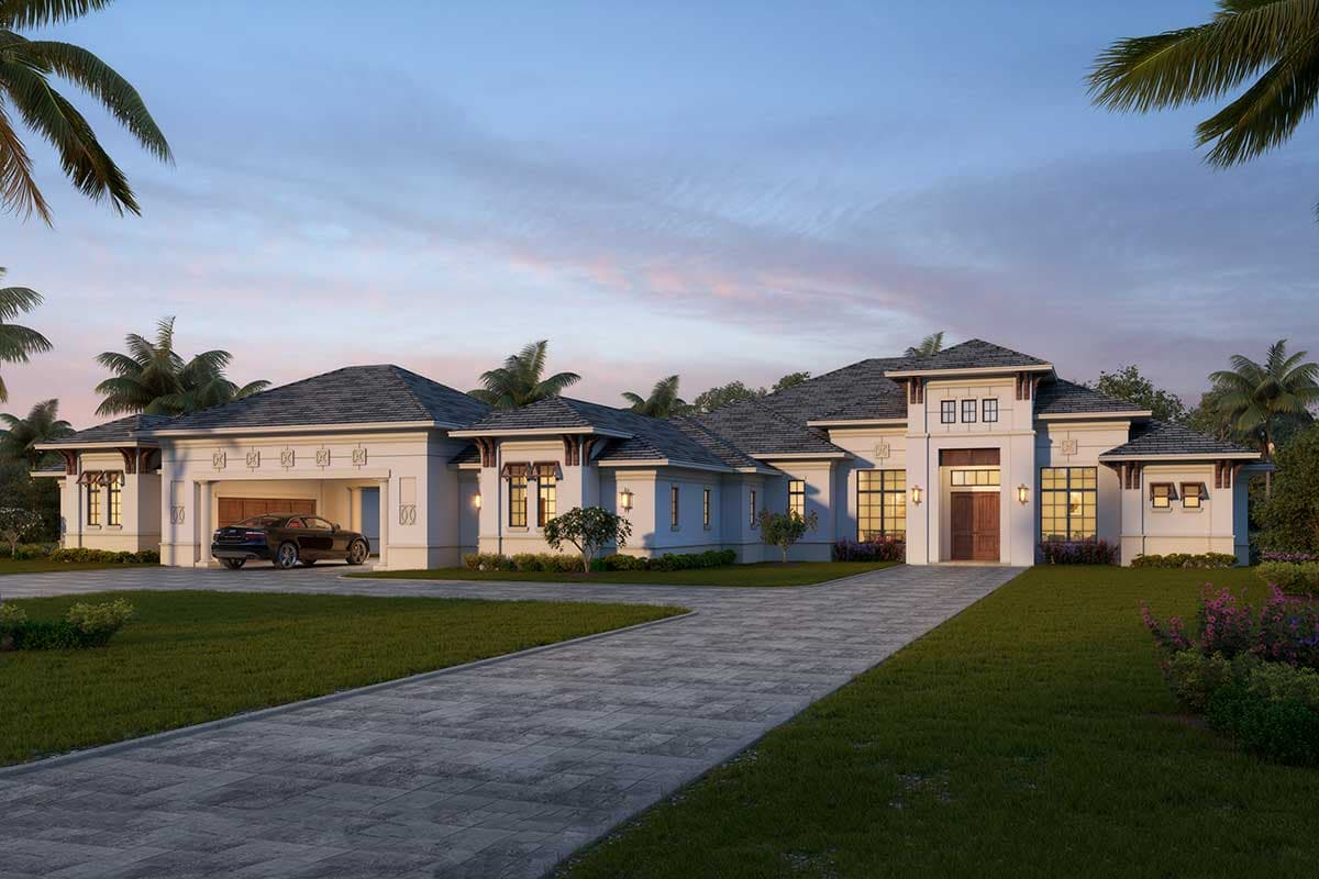 House plan exterior. One-story house in a Mediterranean style, featuring a side-entry garage, gabled roof, and detailed window trim.