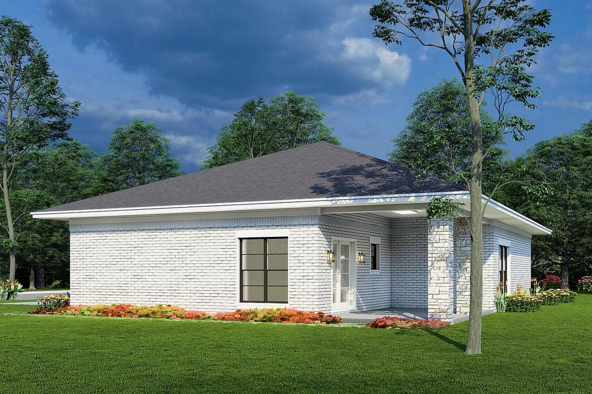House plan exterior: One-story, white brick residence with stone column accents, gabled roof, covered porch, and large windows.