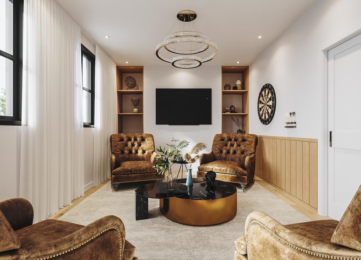 A modern living room with two brown leather armchairs facing a TV. A round coffee table sits in front, with a dartboard on the wall nearby.