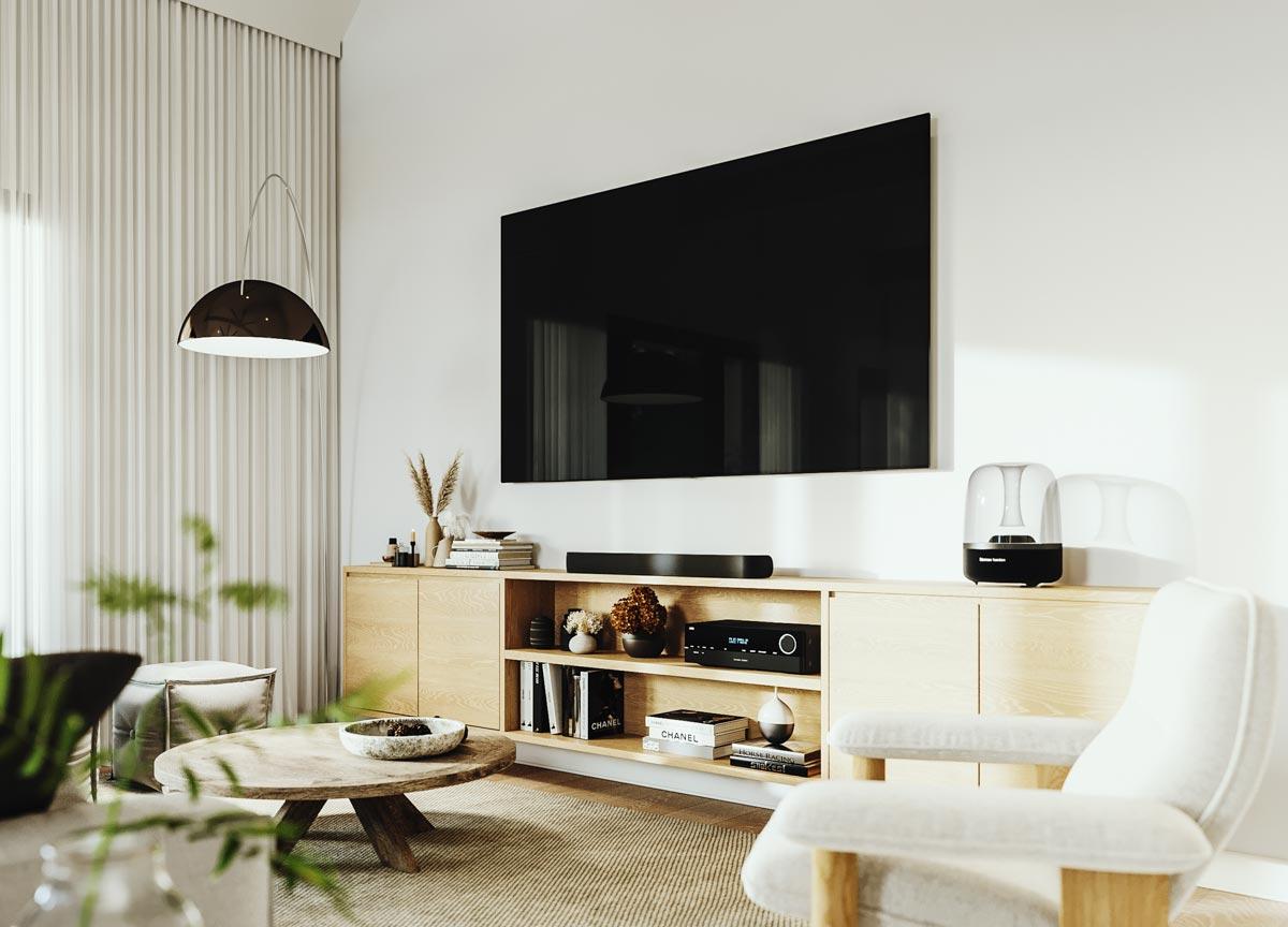 Living room with wall-mounted television over a light wood media console, open shelving, and a curved floor lamp.
