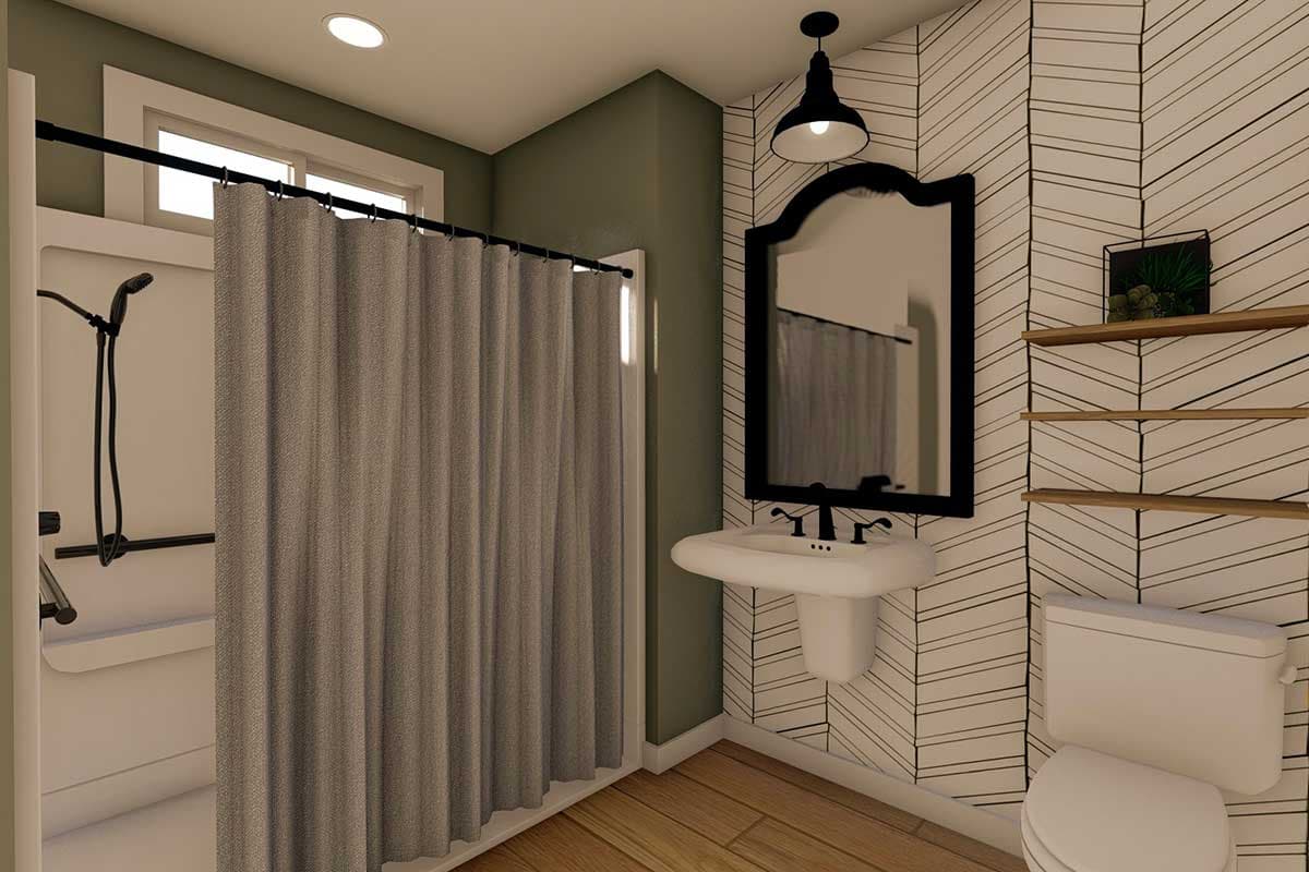 Bathroom with pedestal sink, shower curtain, and patterned wallpaper. Floor plan.