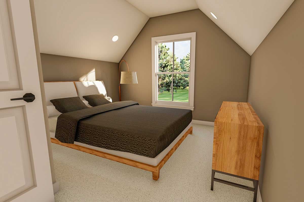 Bedroom interior with vaulted ceiling, a queen bed, window, dresser, and floor lamp.