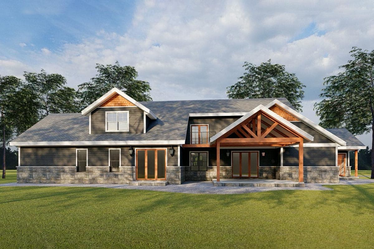 House plan exterior: Two-story modern farmhouse with stone base, prominent gables, and large timber-framed porch.