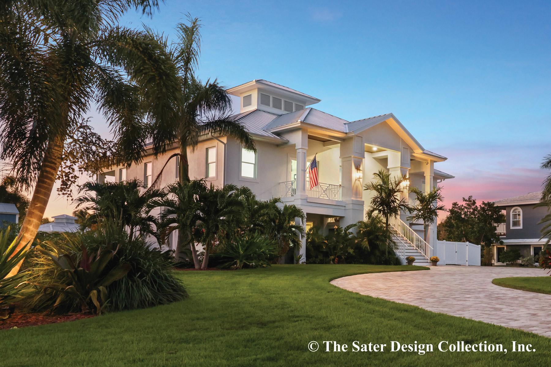 House plan exterior: two-story Coastal style home with metal roof, balconies, porch, and large front stairs.