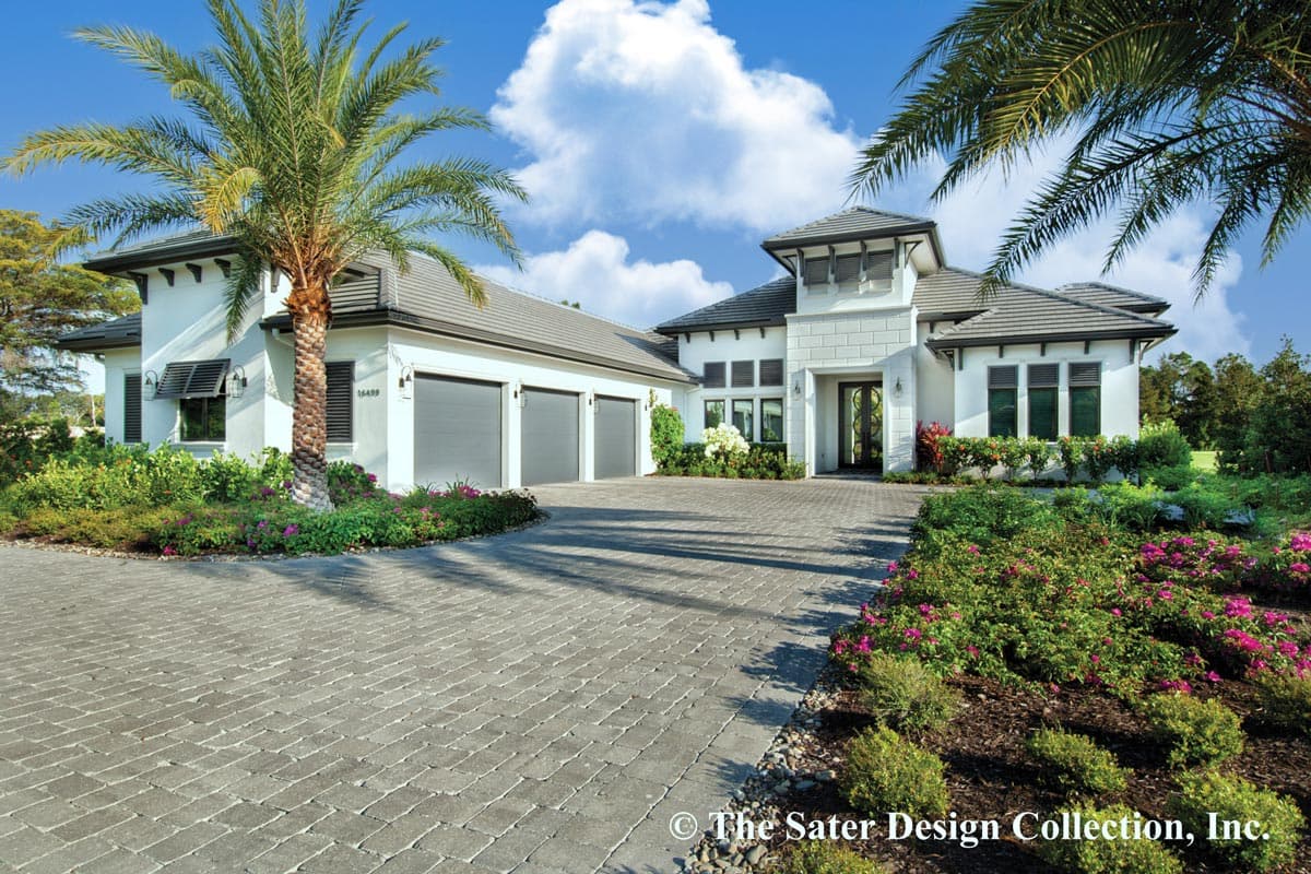 House plan exterior with two stories. Features include a tile roof, three-car garage, and a covered entry. Landscaping and driveway are also shown.