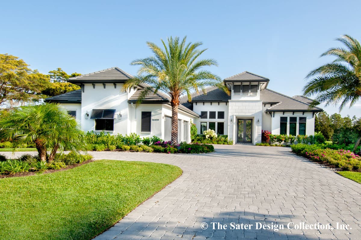 House plan exterior with tile roof, stucco finish, multiple gables, covered entryway, and attached garage.