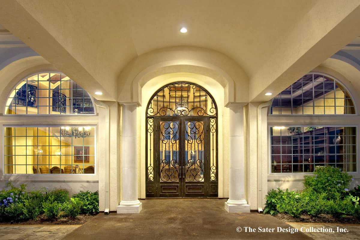 House plan exterior with double arched entry, ornate double doors, and arched windows flanking the entrance.