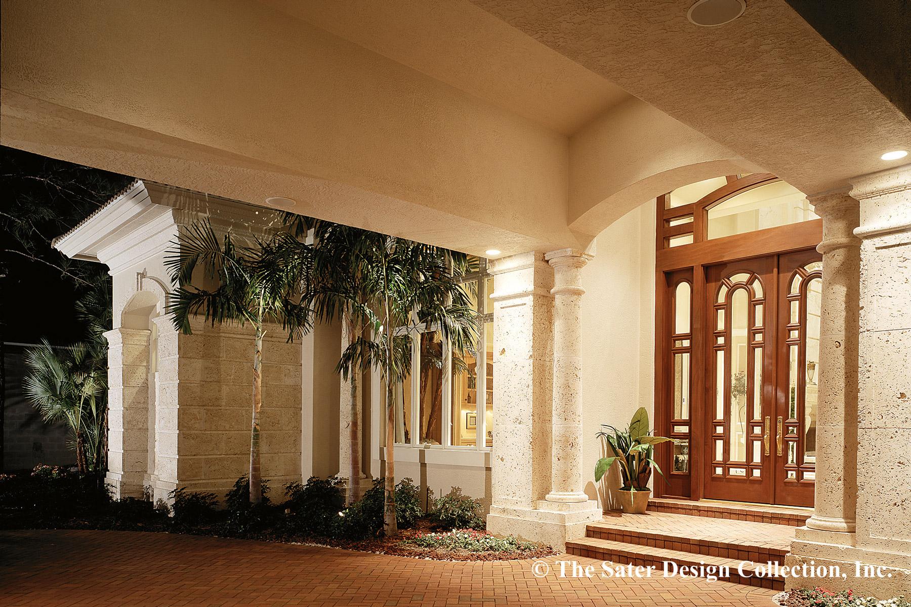 House plan exterior with stone accents, arched entry, and double wooden doors.