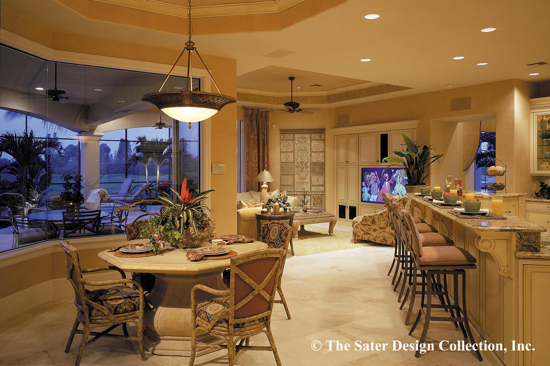 Open-concept interior with dining area, breakfast bar with stools, and living room with entertainment center.