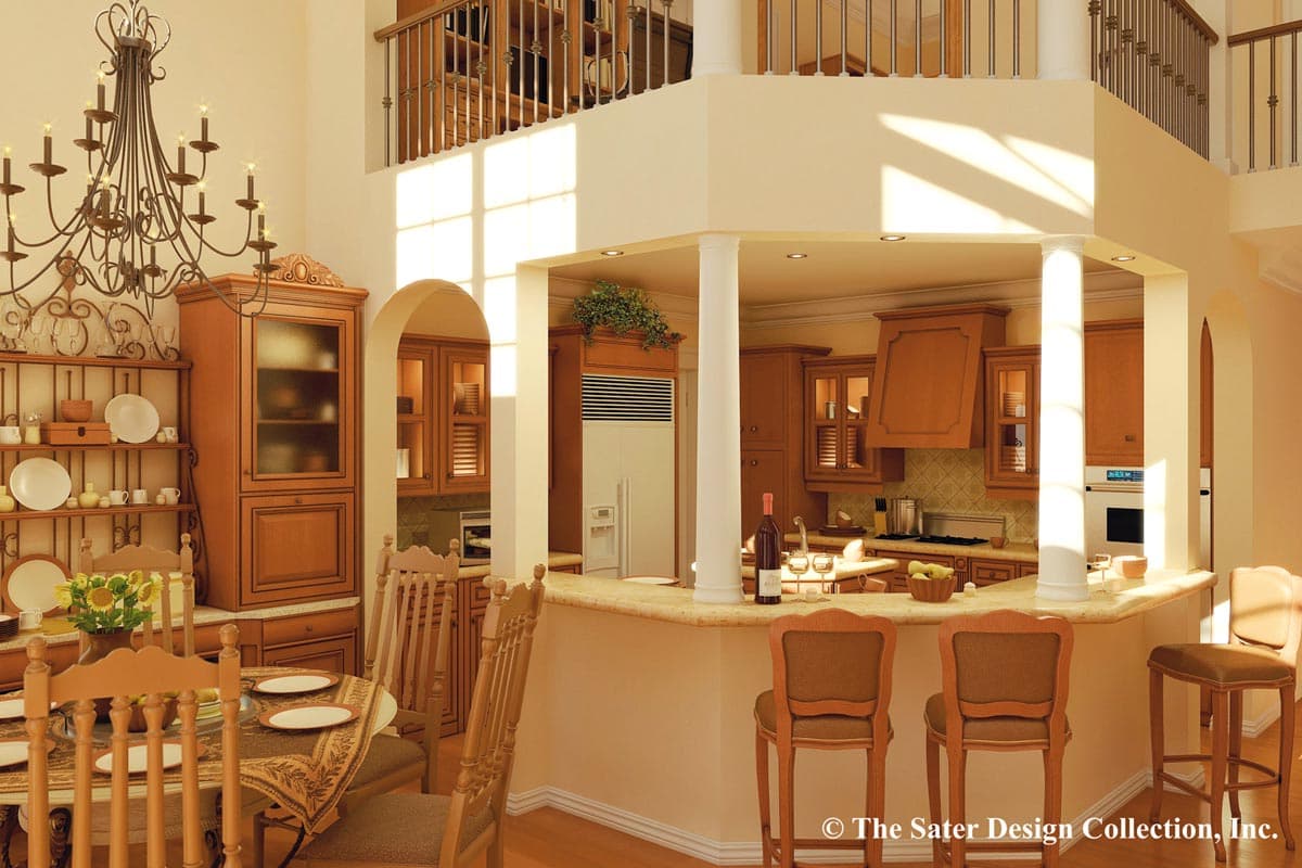 Open concept kitchen with wood cabinetry, island bar, dining area, and open loft above.