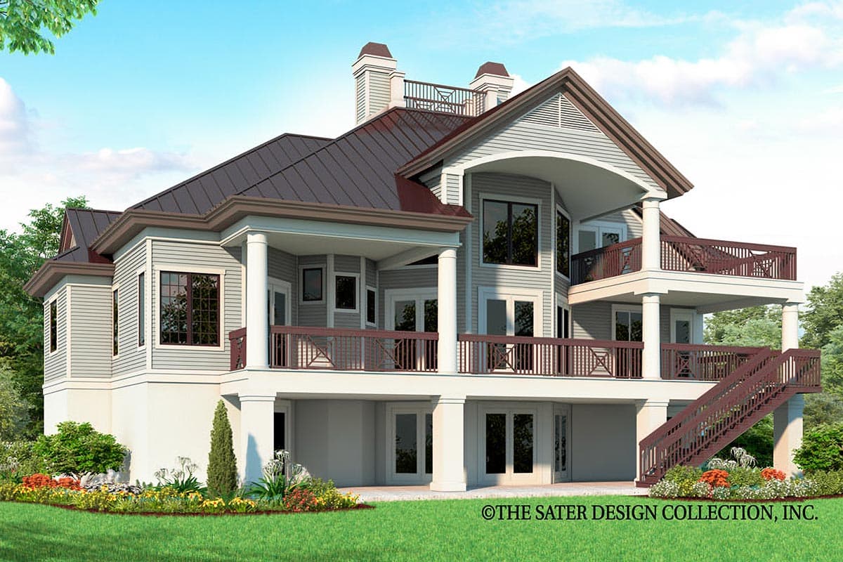 House plan exterior of a two-story home with a metal roof, multiple balconies, and a prominent gable.