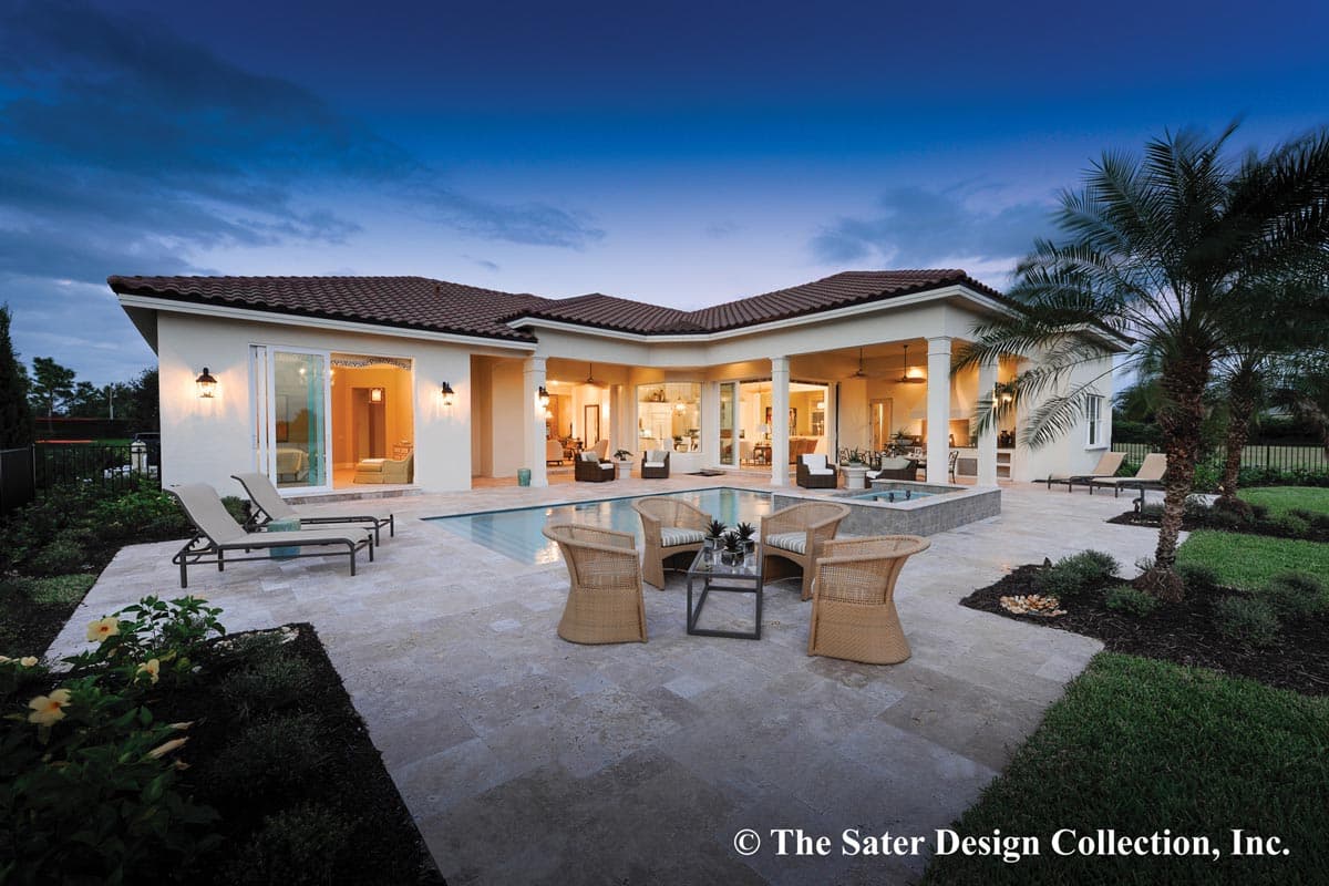 House plan exterior: One-story home with U-shaped courtyard, pool, covered patio with columns, and tile roof.