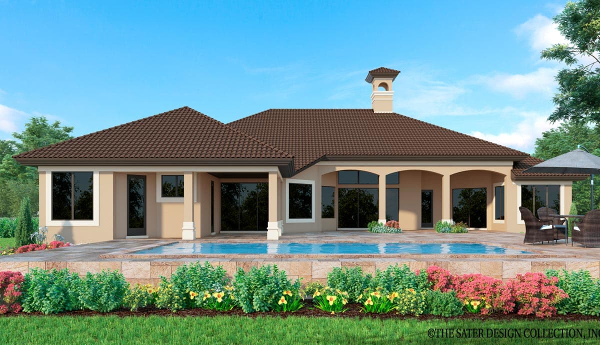 House plan exterior: Single-story residence with tile roof, arched columns, numerous windows, and a chimney.