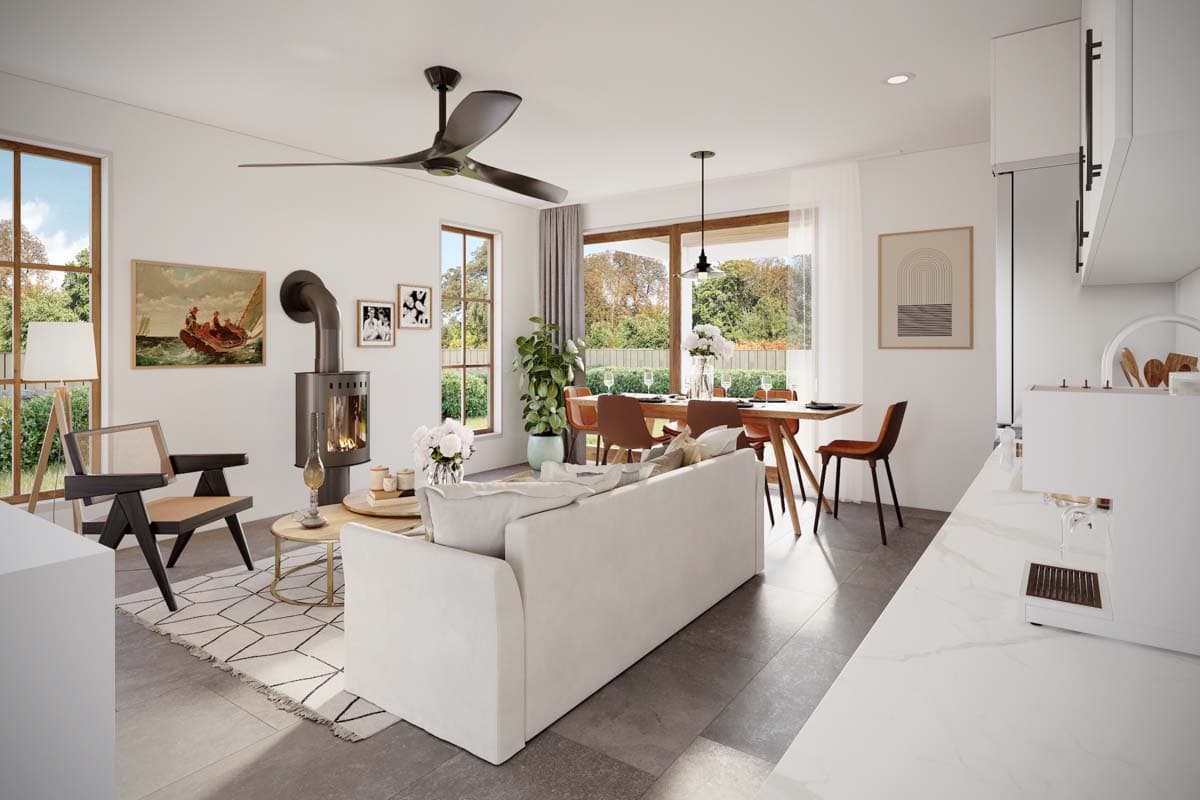 Open-plan living area with sofa, dining table, wood-burning stove, and kitchen island. Large windows provide natural light.