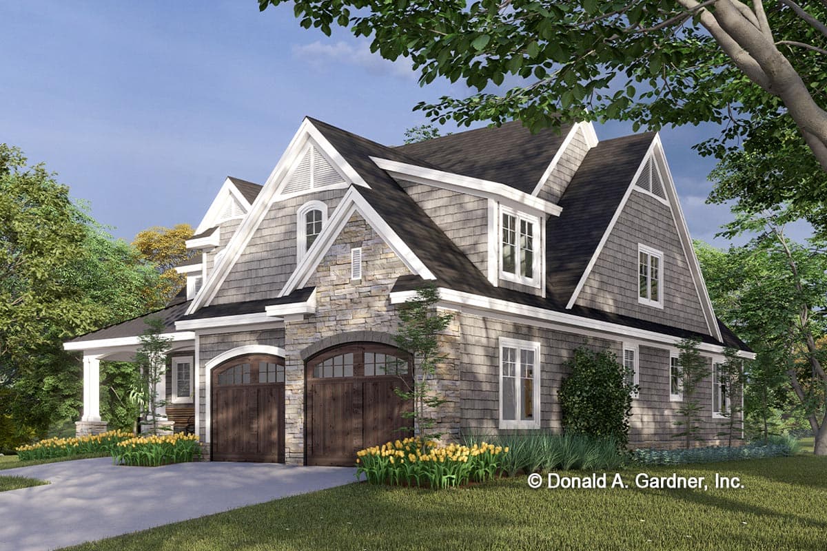 House plan exterior featuring a two-story design with stone and shingle siding, arched garage doors, dormers, and gabled roof.
