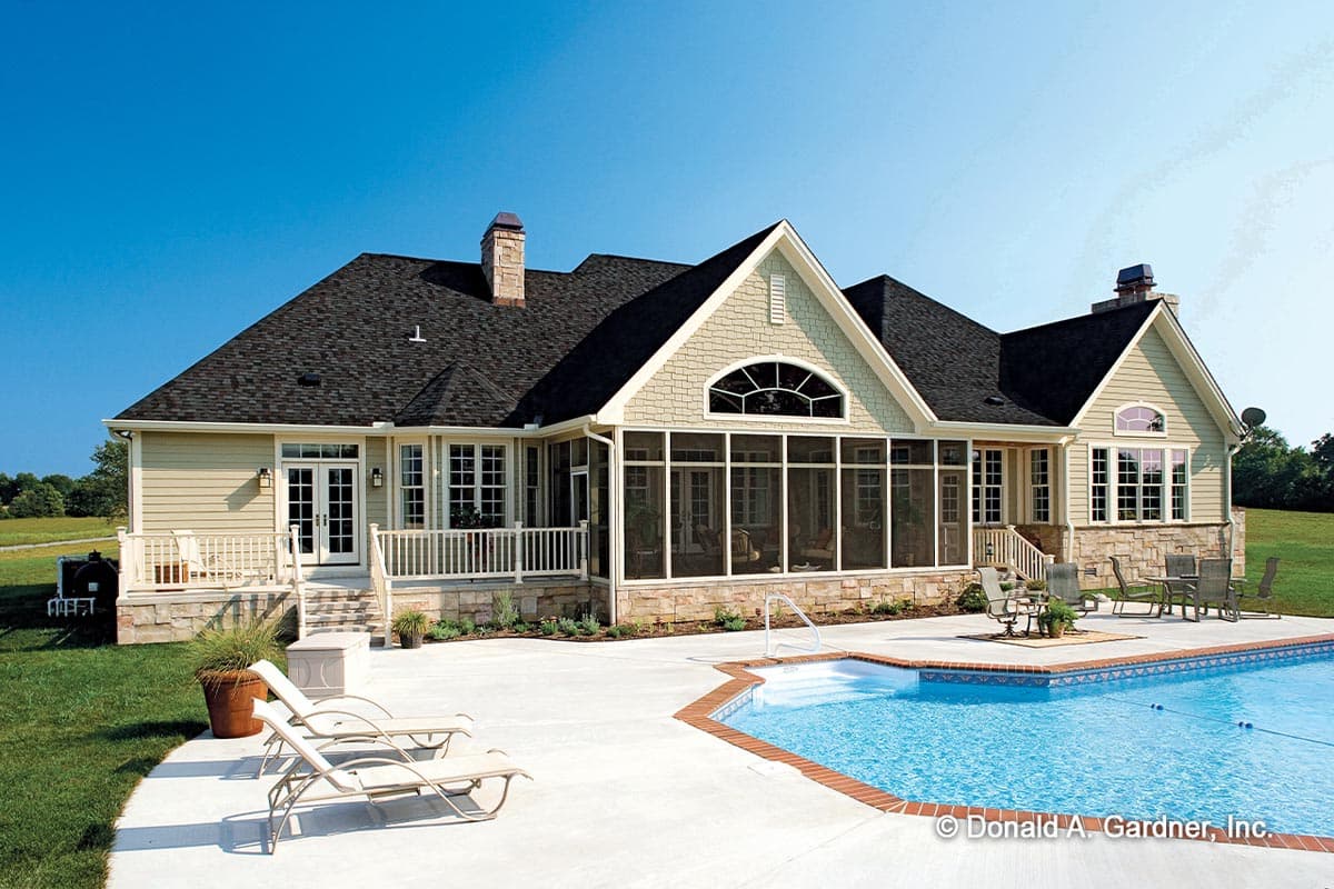 House plan exterior: one-story home with screened porch, stone accents, gabled dormers, and double front doors.