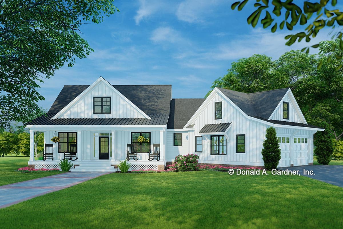 Farmhouse-style house plan exterior with a front porch, multiple gables, and a detached garage with two bays.