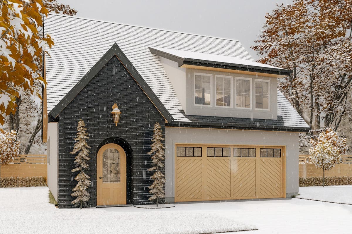 Modern farmhouse house plan exterior with dark brick gable, arched wood door, and detached garage with wood doors.