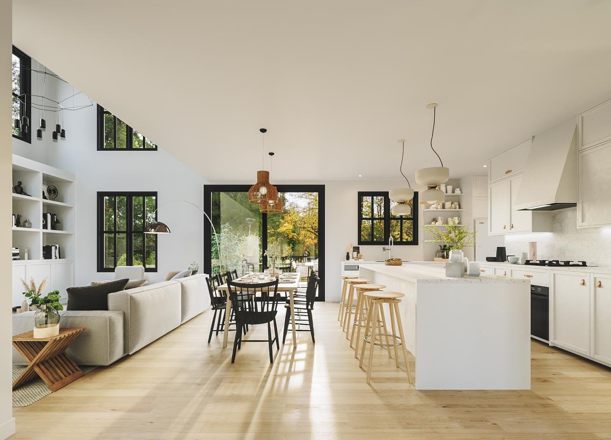 Open-concept living area with vaulted ceiling, modern kitchen island, dining area, and large windows.