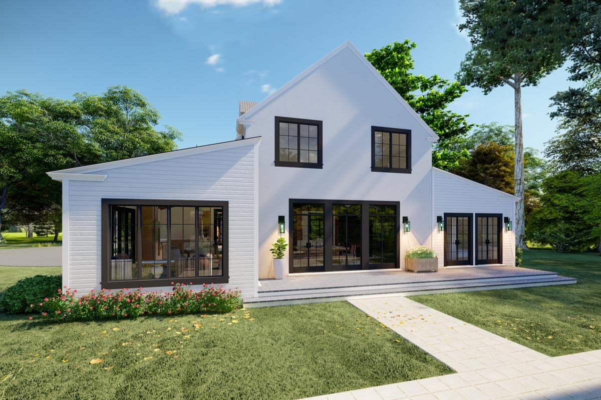 House plan exterior, modern farmhouse style, two stories, white siding, stucco, gable roof, black-framed windows and doors.