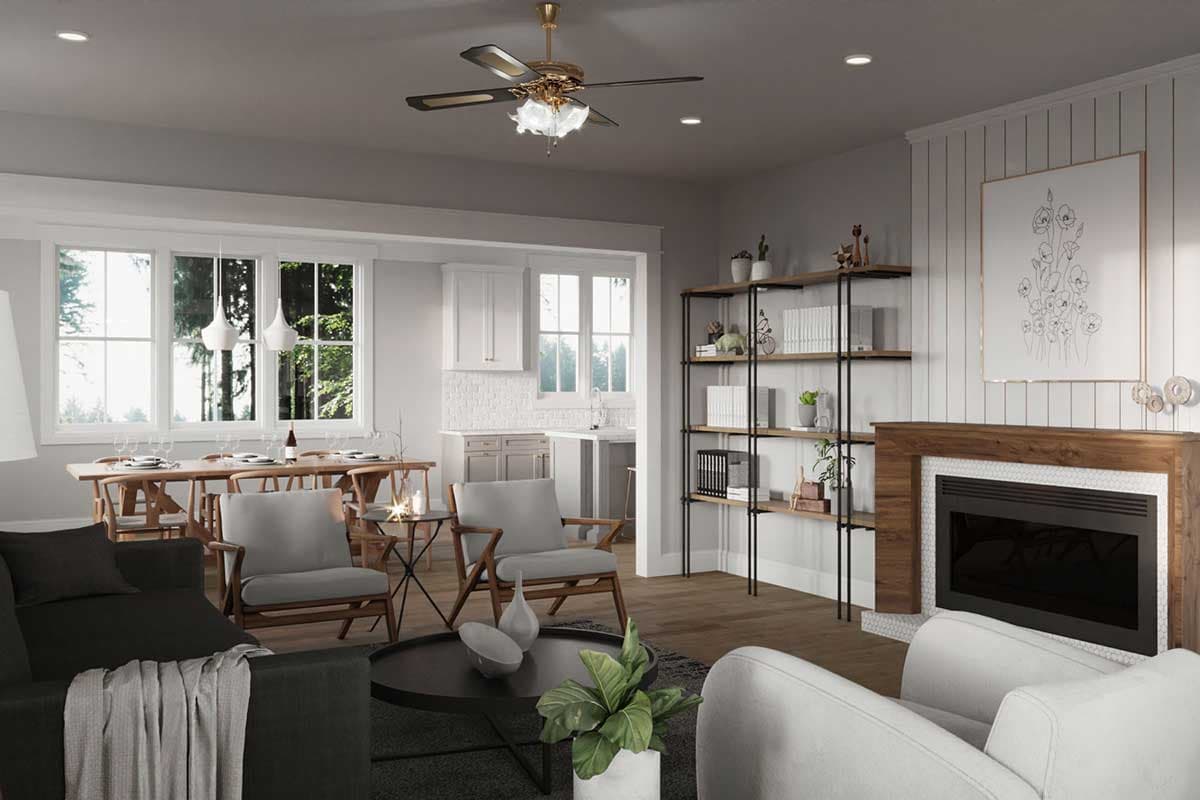 Open-concept living and dining area with fireplace, built-in shelving, and large windows.