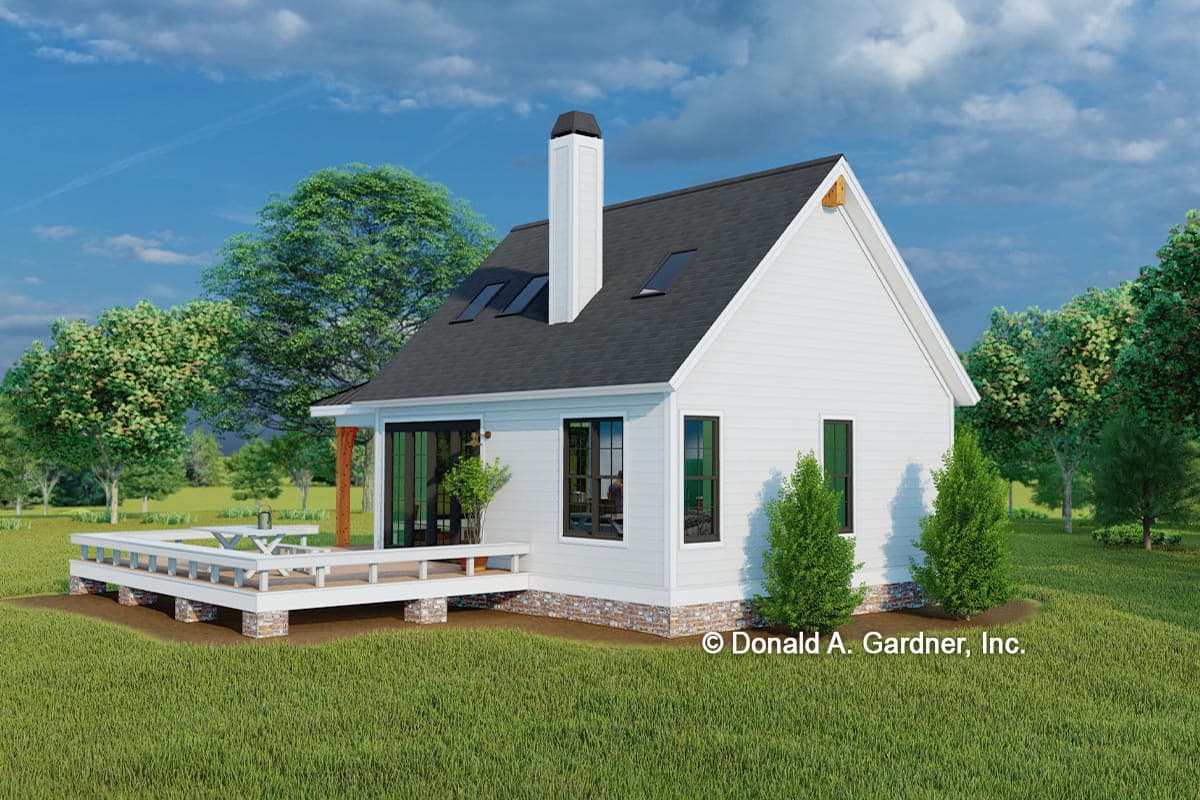 House plan exterior: Modern farmhouse, one story, white siding, pitched roof, dormers, prominent chimney, and wraparound deck.