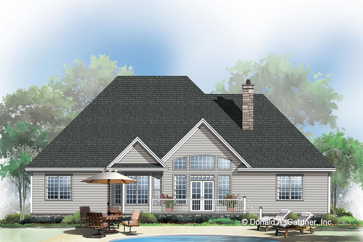 House plan exterior: Ranch style, large gabled dormers, central arched windows, stone chimney, and a wraparound porch.