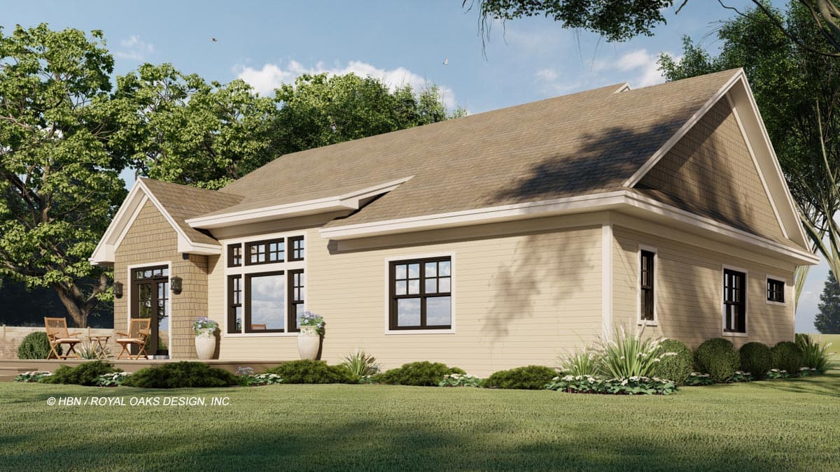 House plan exterior: Ranch style, one story with gabled dormer, shingle siding accents, and covered porch with seating.