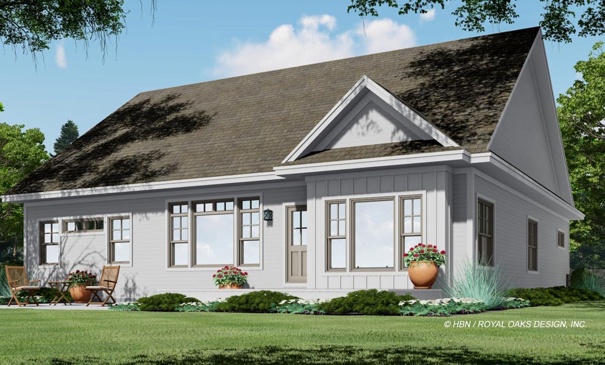 House plan exterior: Ranch style, single story, with gabled dormer and inset entry porch with multiple windows.
