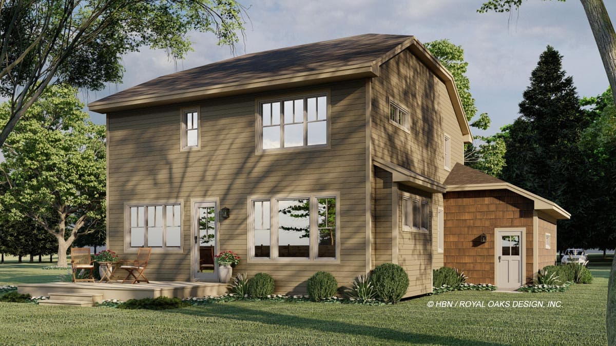 House plan exterior, two stories, horizontal siding, deck with chairs, and attached garage with a shingled facade.