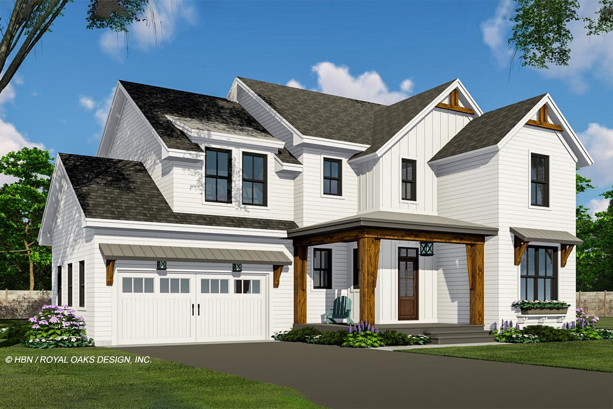 A modern farmhouse with a white exterior, dark gray roof, and a welcoming porch. The house features a garage and landscaped garden.