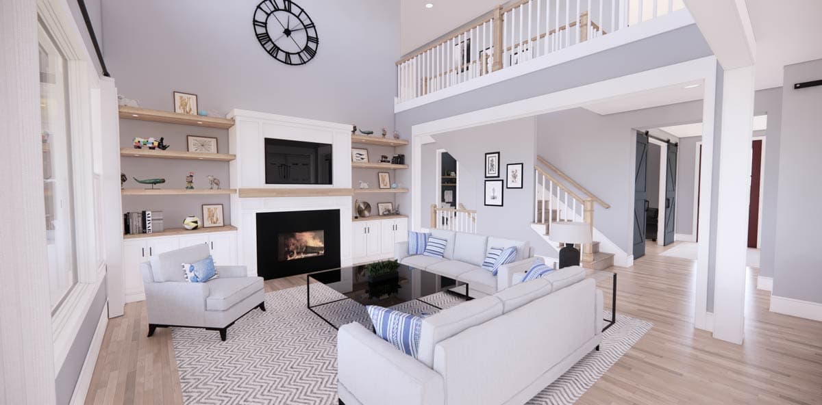 A modern, open-concept living room with high ceilings, a fireplace, and a second-floor balcony. Furnishings include a sofa, chairs, and a large clock.