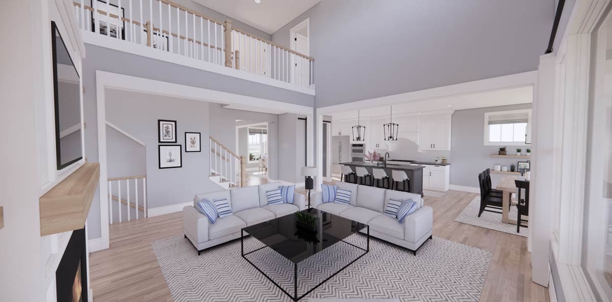 Spacious, modern living space with a high ceiling, two-story layout, and open-plan kitchen and dining area. Neutral colors and natural light abound.