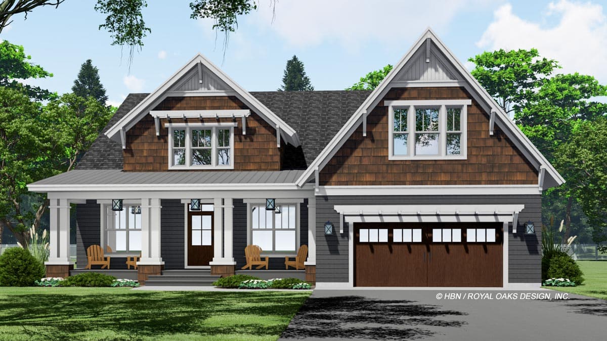 A craftsman-style house with dark gray siding, a welcoming front porch with chairs, and a two-car garage with a brown door.