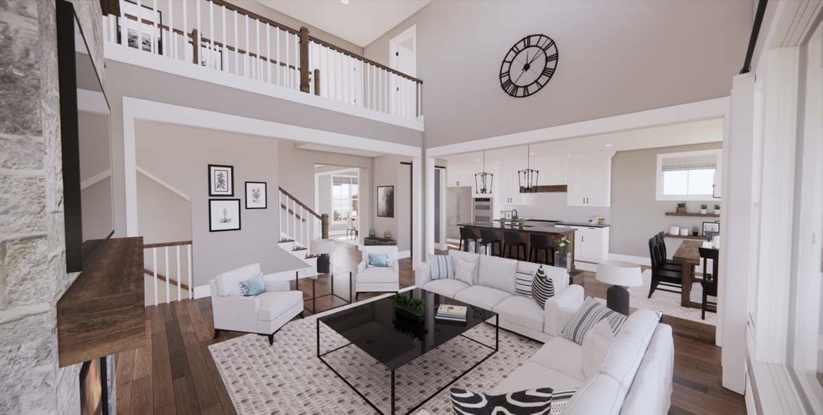 Spacious, modern living room with a two-story ceiling, large clock, white furniture, and a stone fireplace. A dining area and kitchen are visible.